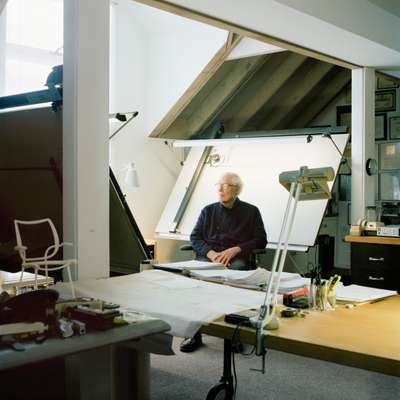 Niels Diffrient at the drawing board in his Connecticut studio