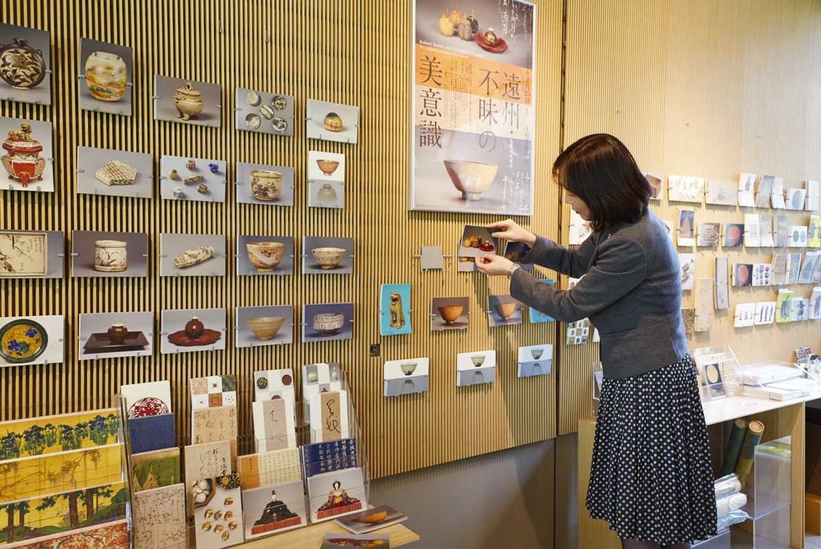 Mamiko Arakawa stocks postcards for a new exhibition at the Nezu Art Museum