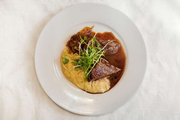 Steak with polenta and cognac sauce