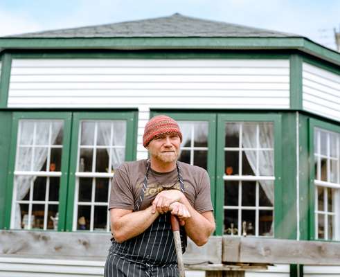 Todd Perrin outside Mallard Cottage