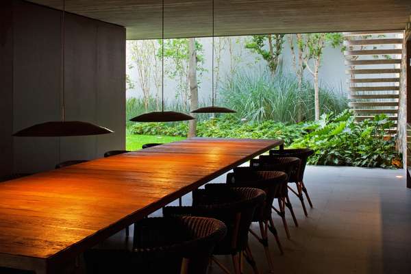 Marcio Kogan designed the dining table