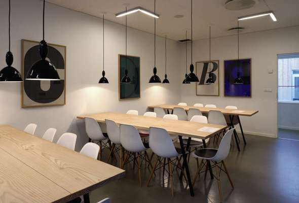 Canteen with lights by Muuto and Eames chairs
