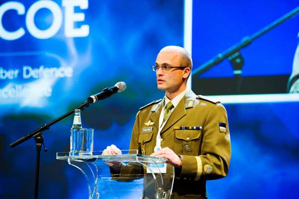 Col Ilmar Tamm at the podium