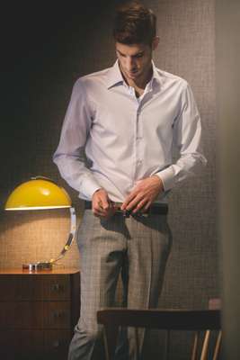 Shirt by Canali, T-Shirt by Gunze, Trousers by Gucci, Belt by Hackett. 