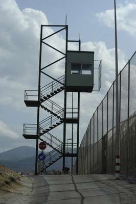 A sentry tower along the border fence