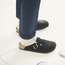 Trousers by Eleventy, socks by Uniqlo, clogs by Birkenstock