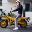 Designer Takuya Kawashima, 30, has been a scooter fan for three years. He uses his Honda Motra for commuting