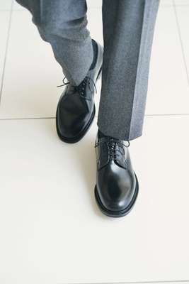 Trousers by Canali, socks by United Arrows, shoes by Church’s