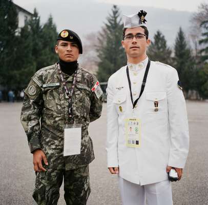 Athlete from Monaco’s navy, right, and Italian army officer