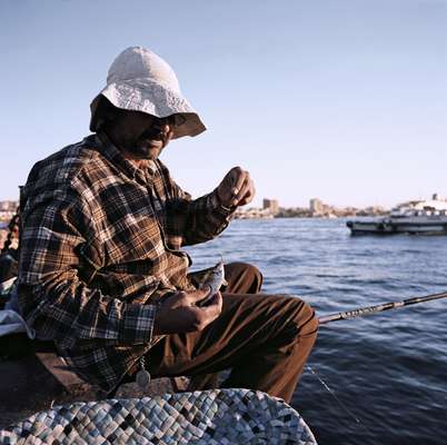 Fisherman at passenger terminal in Port Said