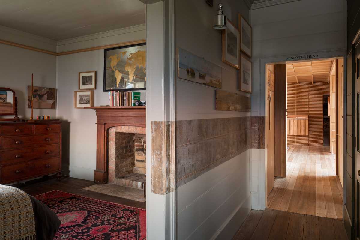 The central passage divides the original bedrooms 