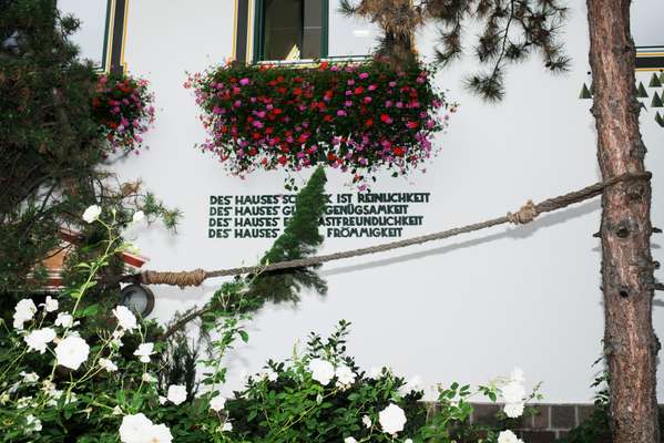 Inscription on wall of brewery (rough translation: ‘The luck of the house is cleanliness, frugality, hospitality and piety’)