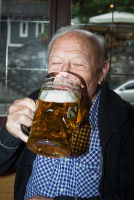 Retired Forst brewery worker Franz Werner, 89, enjoying  an aperitif