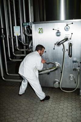 Employee in the ageing cellar