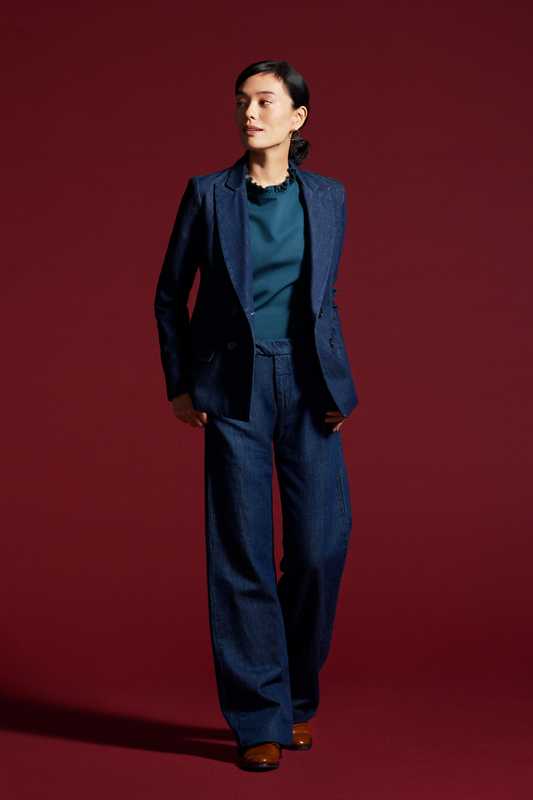 Jacket and trousers by Roy Roger’s, pullover shirt by Atlantique Ascoli, shoes by Church’s, earrings by Stephanie Cachard