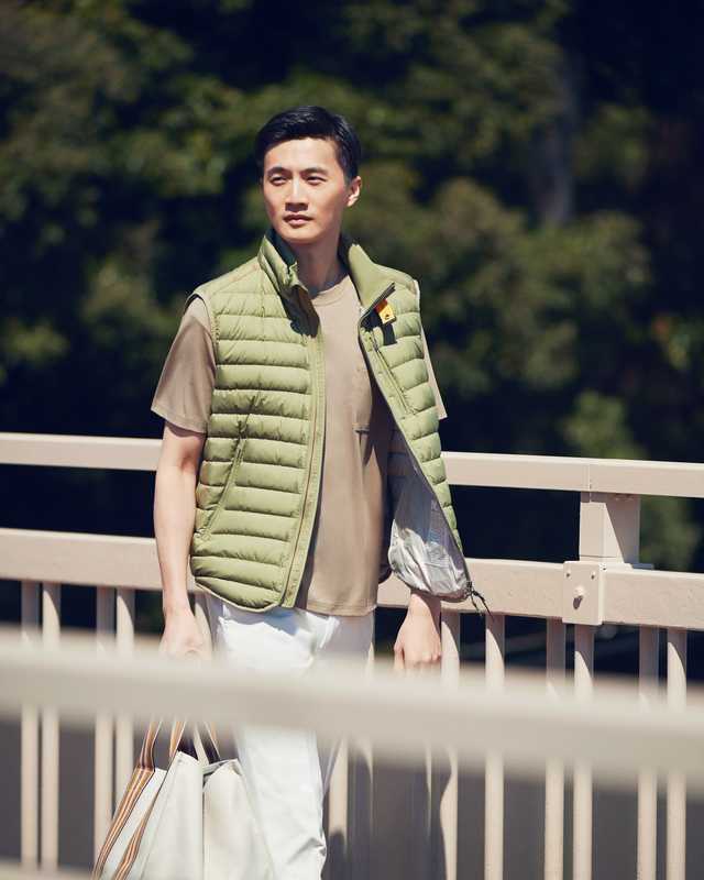 Vest by Parajumpers, t-shirt by Adam et Rope, trousers and bag by Loro Piana