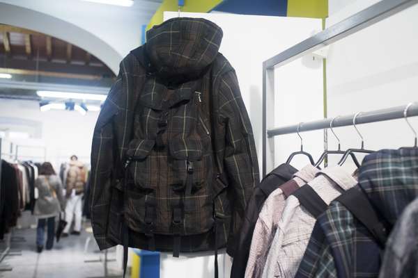 A backpack integrated into a coat at the M stand