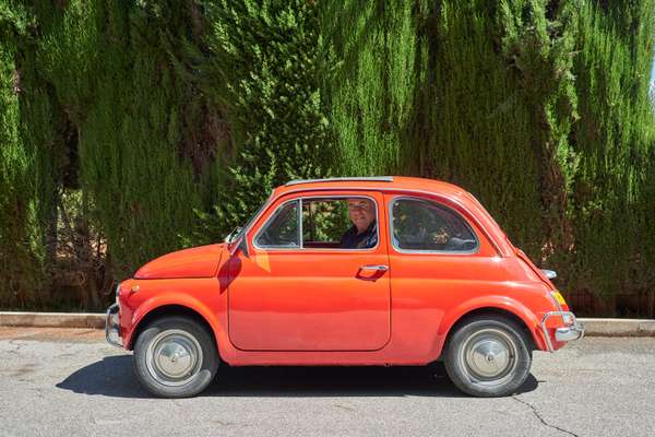 Former ambassador Alberto Boniver in his beloved Fiat Cinquecento