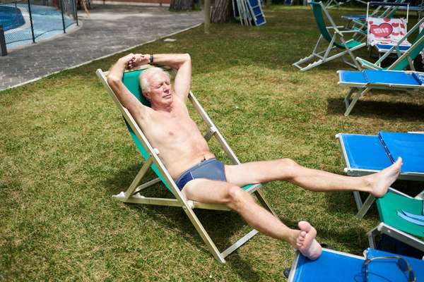 Sergio Bianchi making full use of the deck chairs; he worked for Fiat in several countires around the world