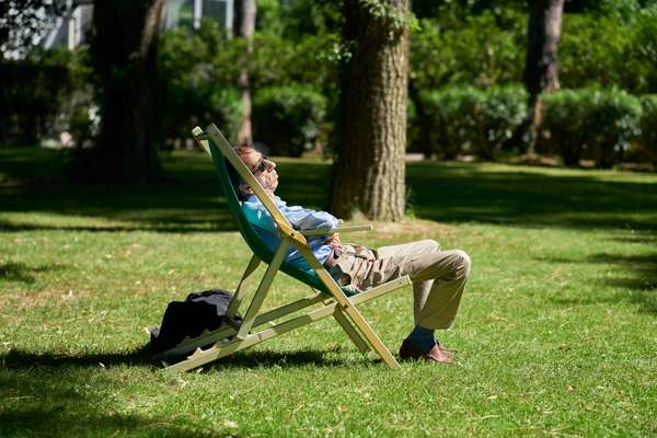 Francesco Badolato sleeping in the sun; his mother worked at the ministry