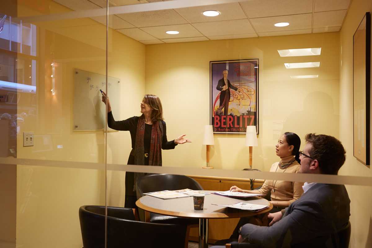 Peru-born instructor Carmen López teaching a Spanish class