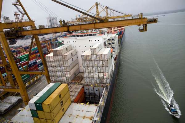 Shipping containers on a tanker in the main port