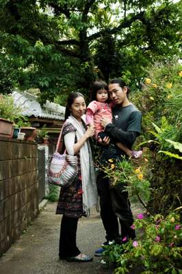 A family living in Naha: Fukuko (left), Lala and Yusuke Ono
