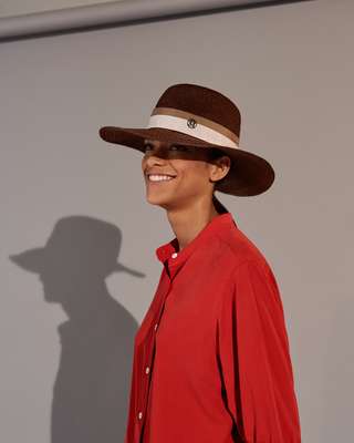 Shirt by Holland & Holland, hat by Maison Michel