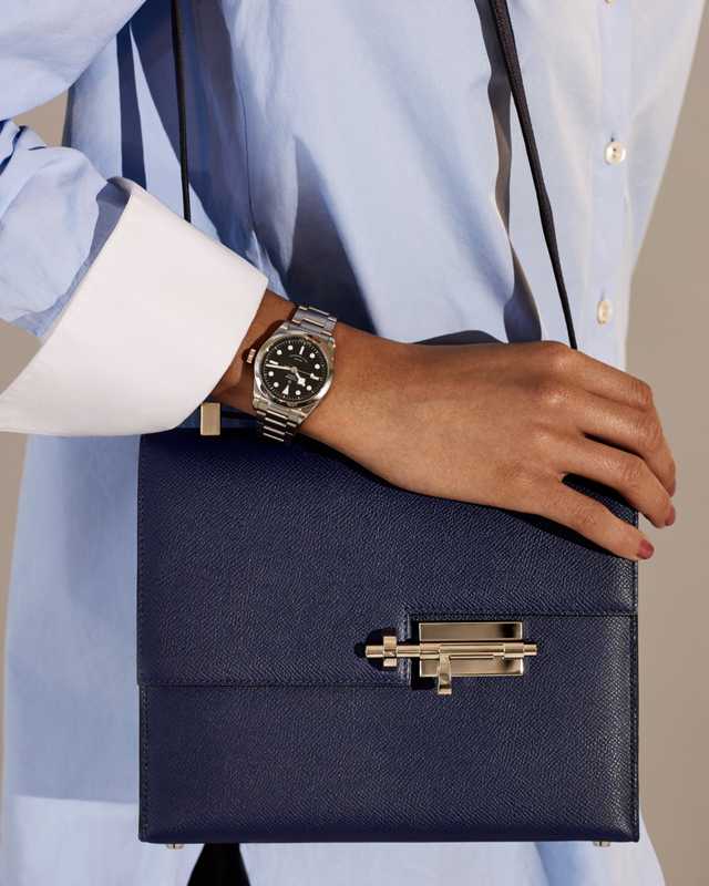 Shirt by Monographie, watch by Tudor, bag by Hermès