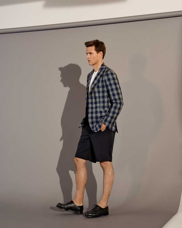 Jacket by Orazio Luciano, t-shirt by Wild Life Tailor,  shorts by Itty-Bitty, shoes by JM Weston