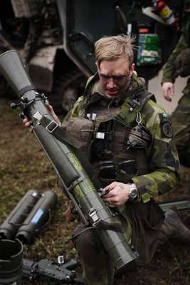 Soldier attending to a recoilless rifle