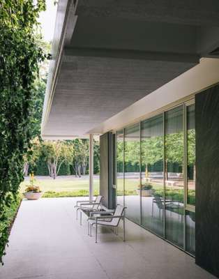 Terrace seating outside the Miller House