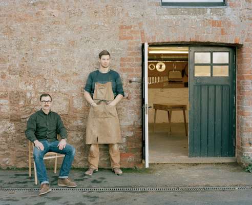 Young and Norgate founders Dave Young (left, seated) and Ross Norgate (right, standing)