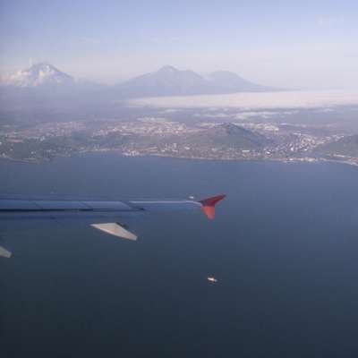 Petropavlovsk approached from Avacha bay with Koryaksky volcano in the background 