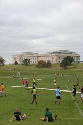 An after-work football match, with Auckland Museum in the background