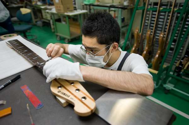 Craftsman at work in assembly room