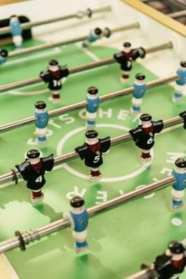 Playing foosball 