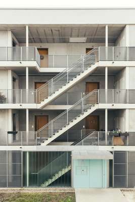 Open staircase in one of Gewoba’s Bremen Cubes