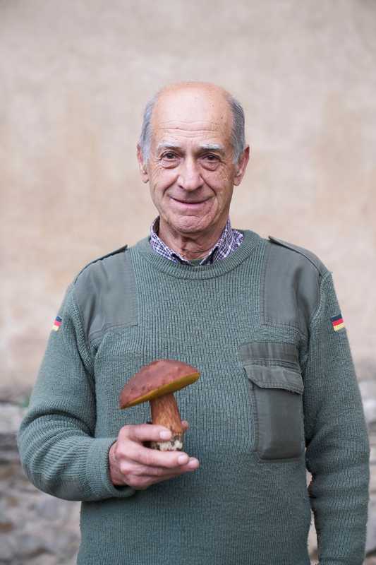 Silvano Bartoli collecting mushrooms