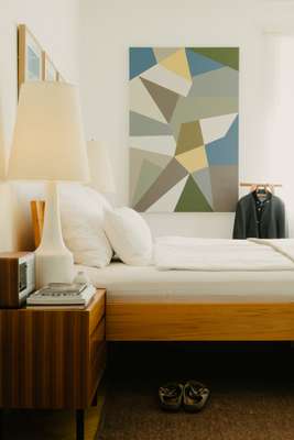 Virge artwork and vintage Lotte Lamp in master bedroom