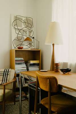 Table and shelving unit by Switzerland’s  USM; the chair came with the house