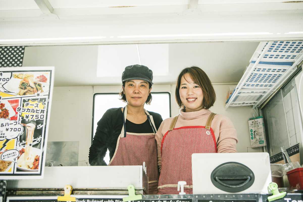 Jang Hye Kyung (left) sells authentic Korean food