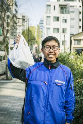 Sagawa delivery man making a pit-stop