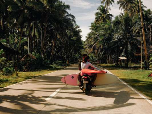 Many motorbikes come with a surfboard rack on the side