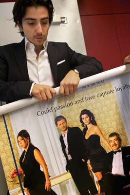 A poster for the series As¸k-ı Memnu in the Kanal D sales and acquisitions office