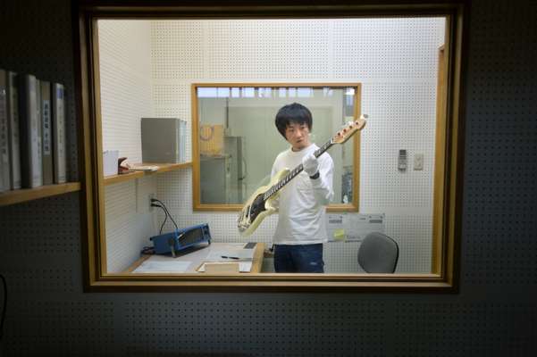 Yutaka Yobayashi tests the sound 