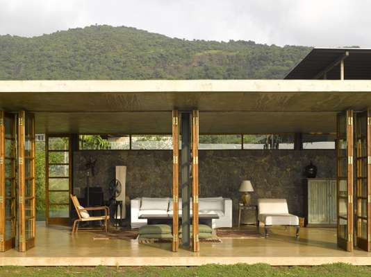 The large living room opens out onto the landscape