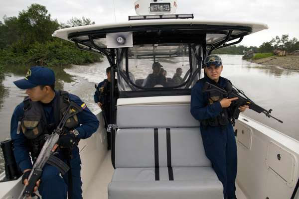 The Navy and coast guard patrol waters around the port in search of traffickers