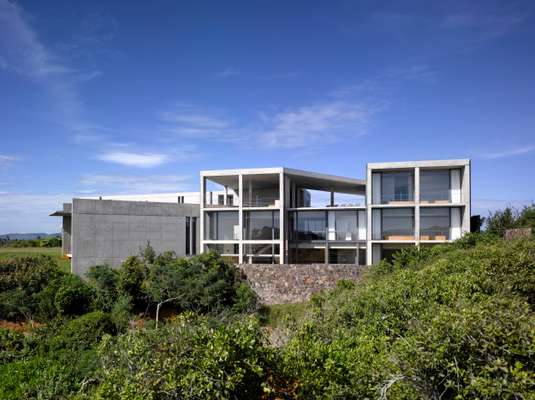 Most rooms have floor-to-ceiling windows or walls open to the exterior