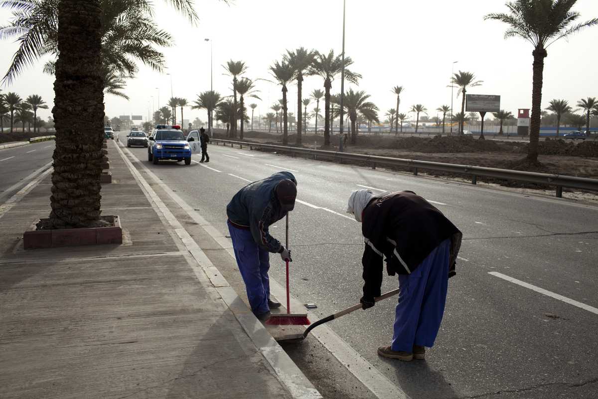 Workers at Baghdad Airport Road